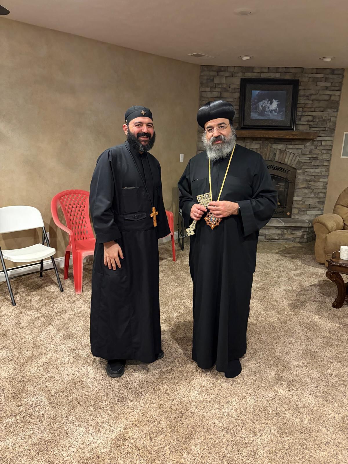 Fr. Daniel standing with His Grace Bishop Karas