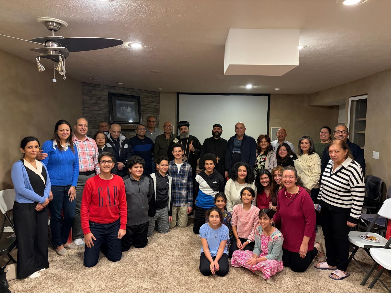 Families and students at a fellowship gathering